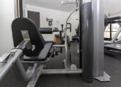 Thumbnail 14 of 28 - Workout Machines In Gym at Eucalyptus Grove Apartments, Chula Vista, CA, 91910